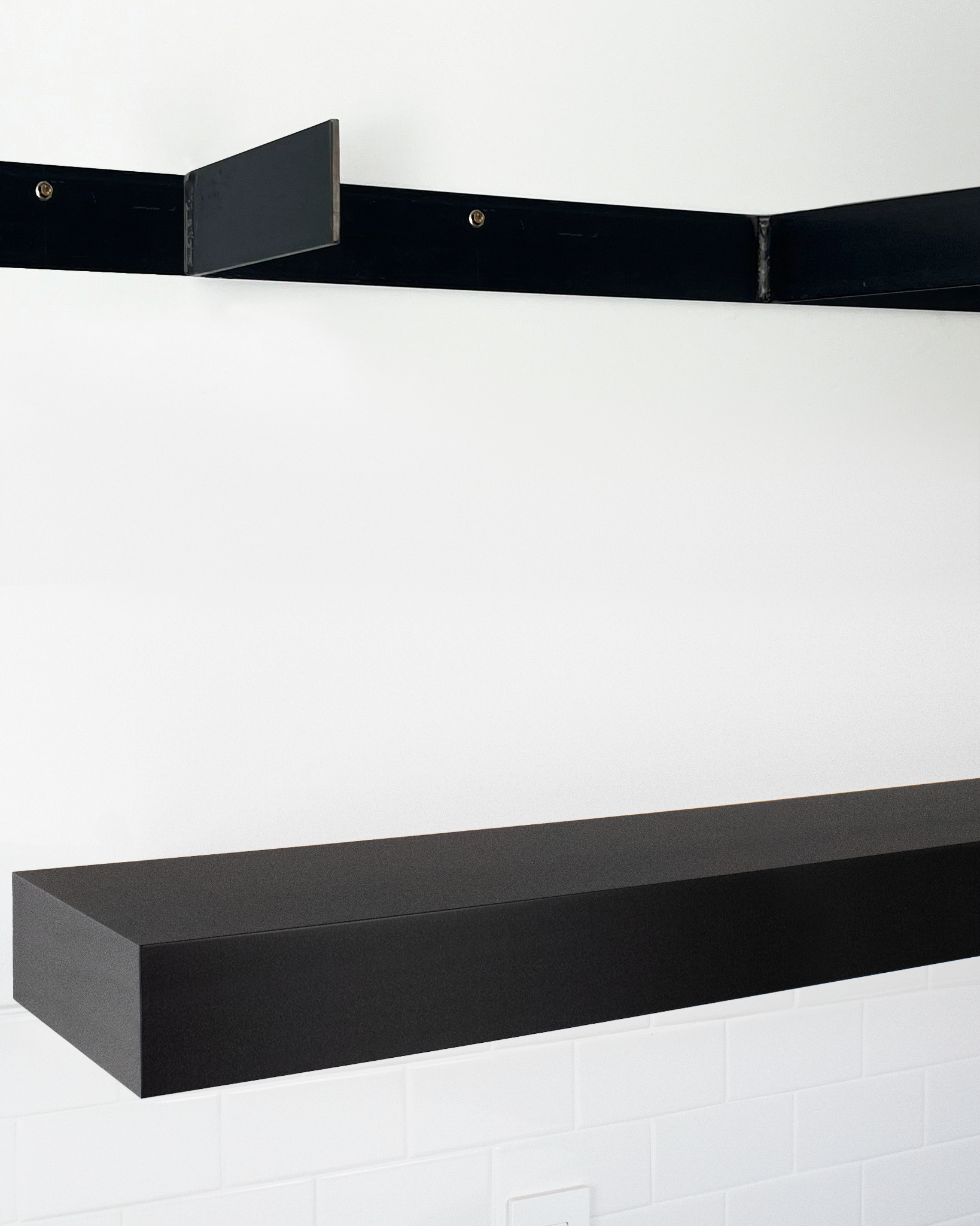 Black floating shelf 4 inch thick angle view installed steel HW top