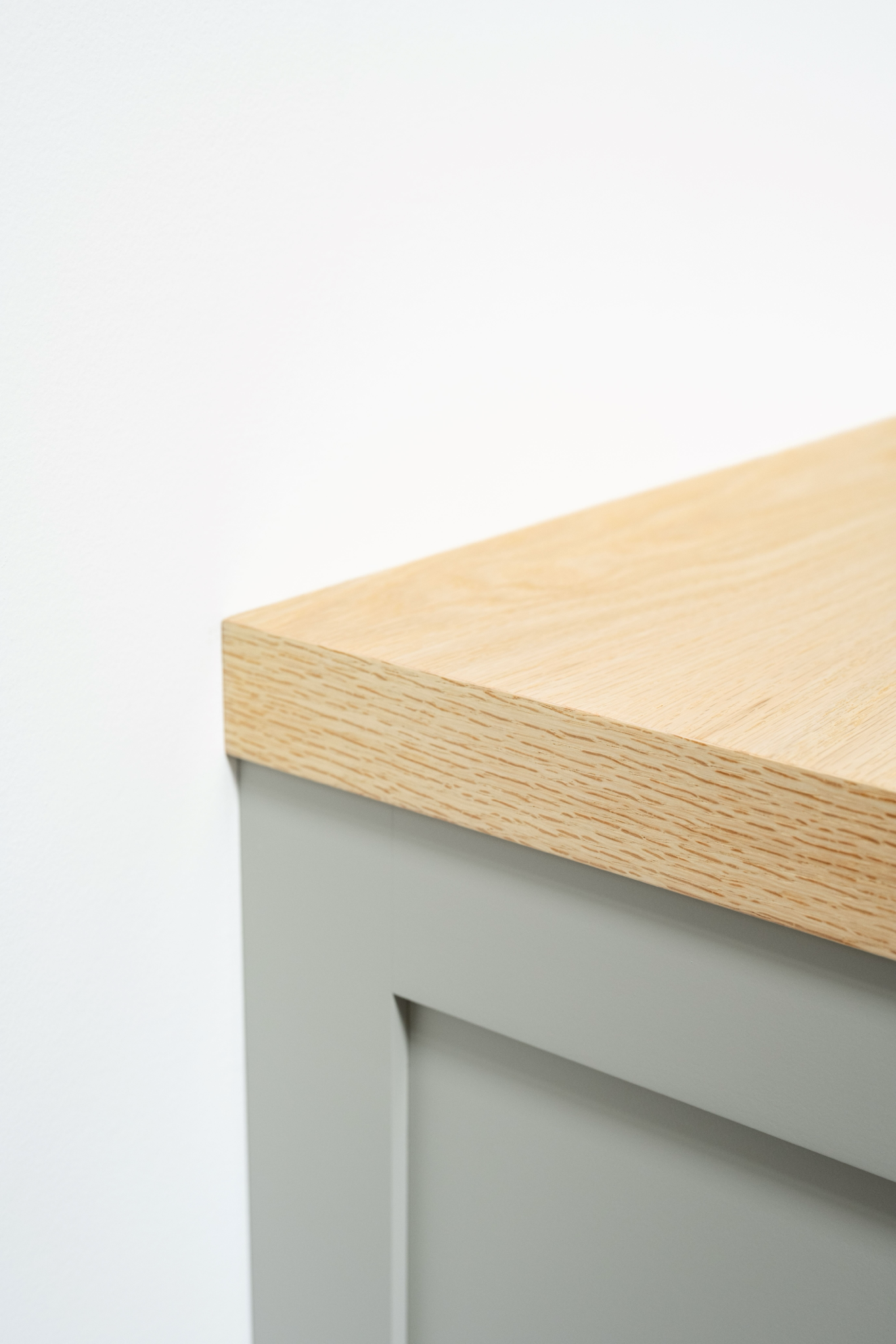 Bleached oak cabinet top corner edge