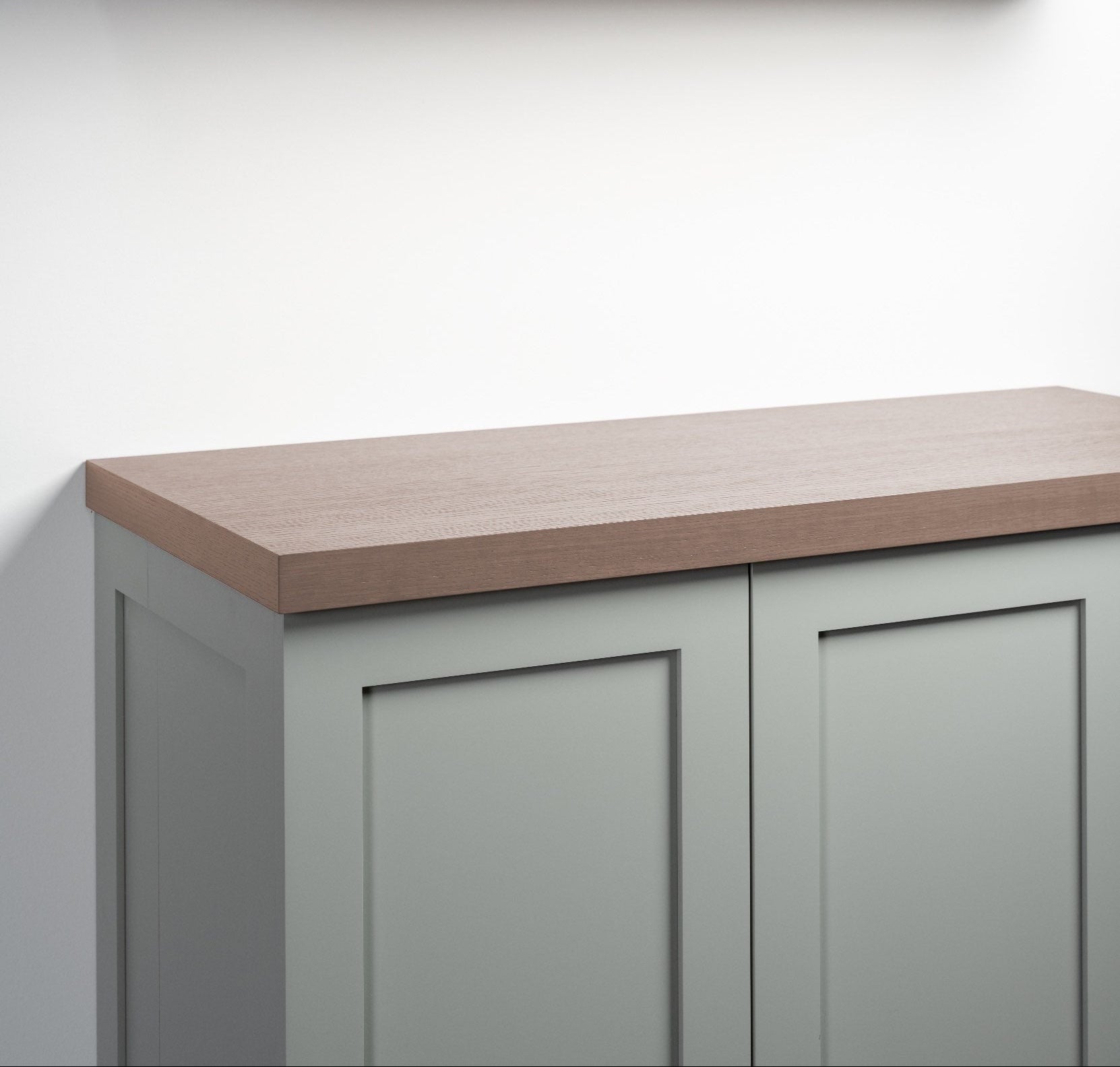 Driftwood grey slab cabinet top front angle view