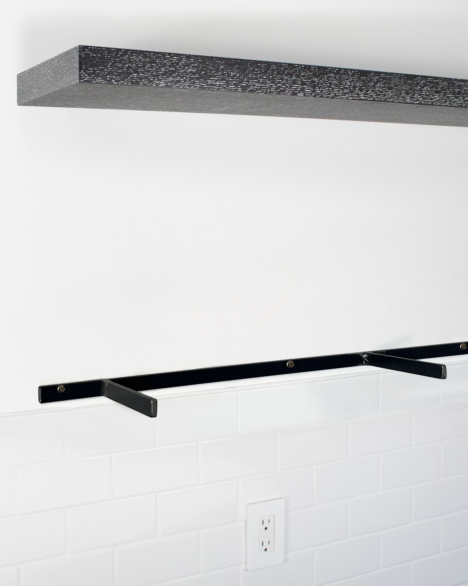 Ebonized cerused oak floating shelf 1.75 inch thick angle view installed steel HW