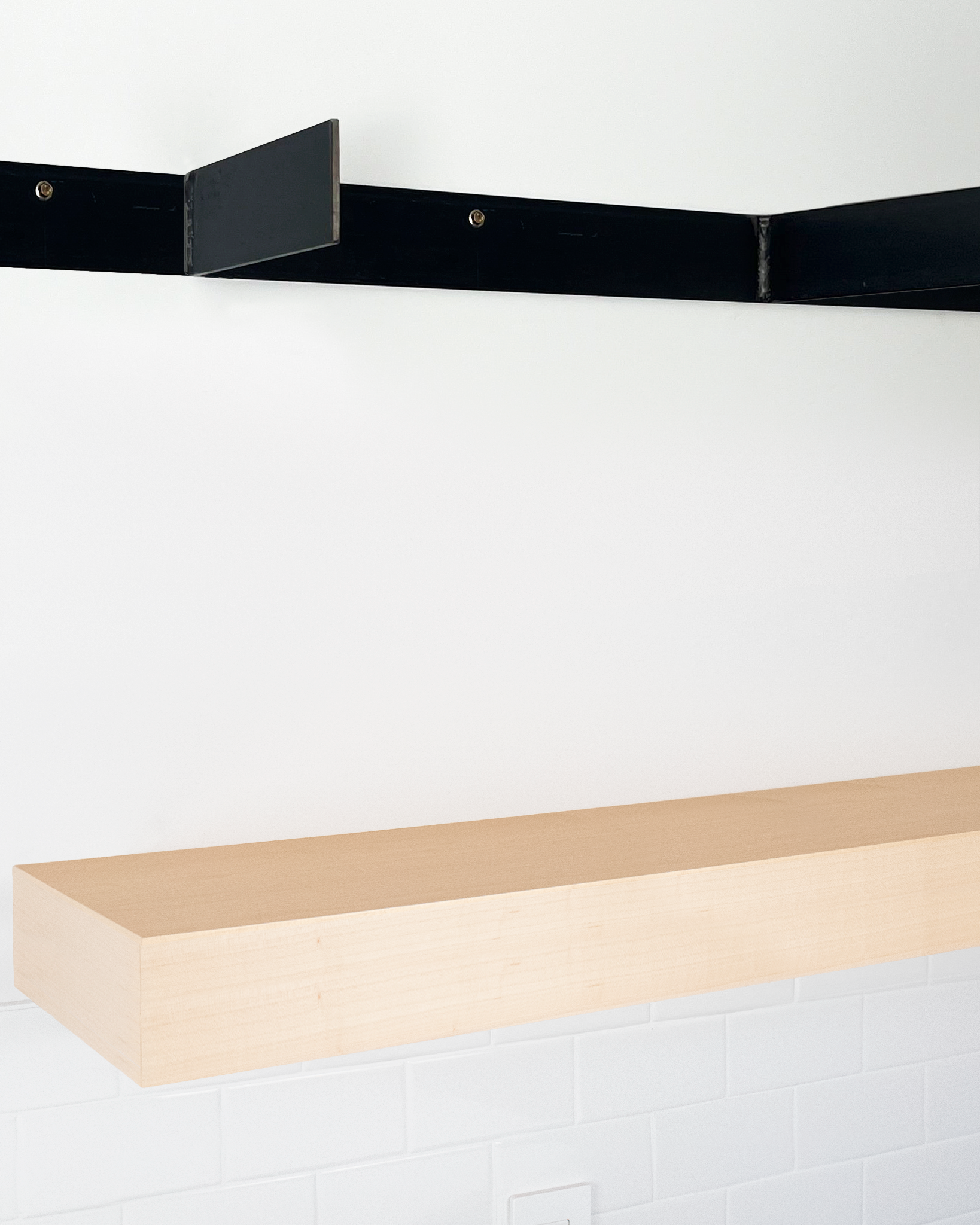 Maple floating shelf 4 inch thick angle view installed steel HW top