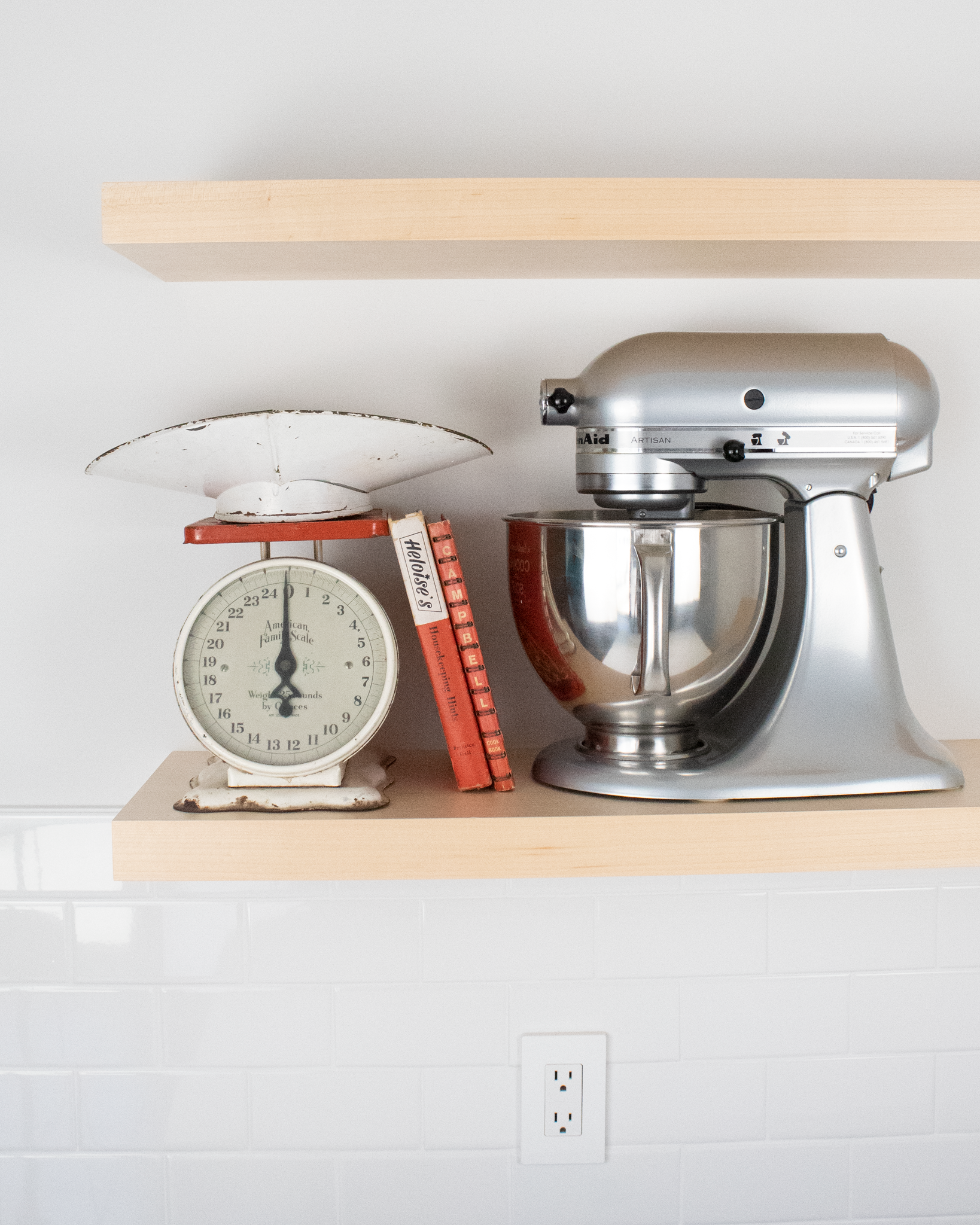 Maple shelf 1.75" thick on a wall displaying a mixer, cookbooks and a scale