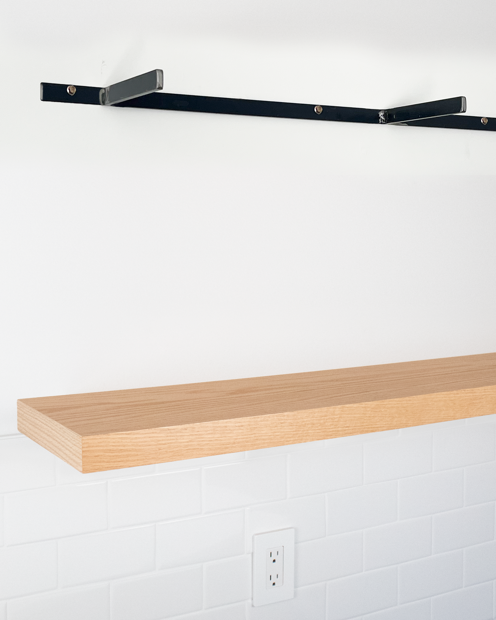 Red oak floating shelf 1.75 inch thick angle view installed steel HW top