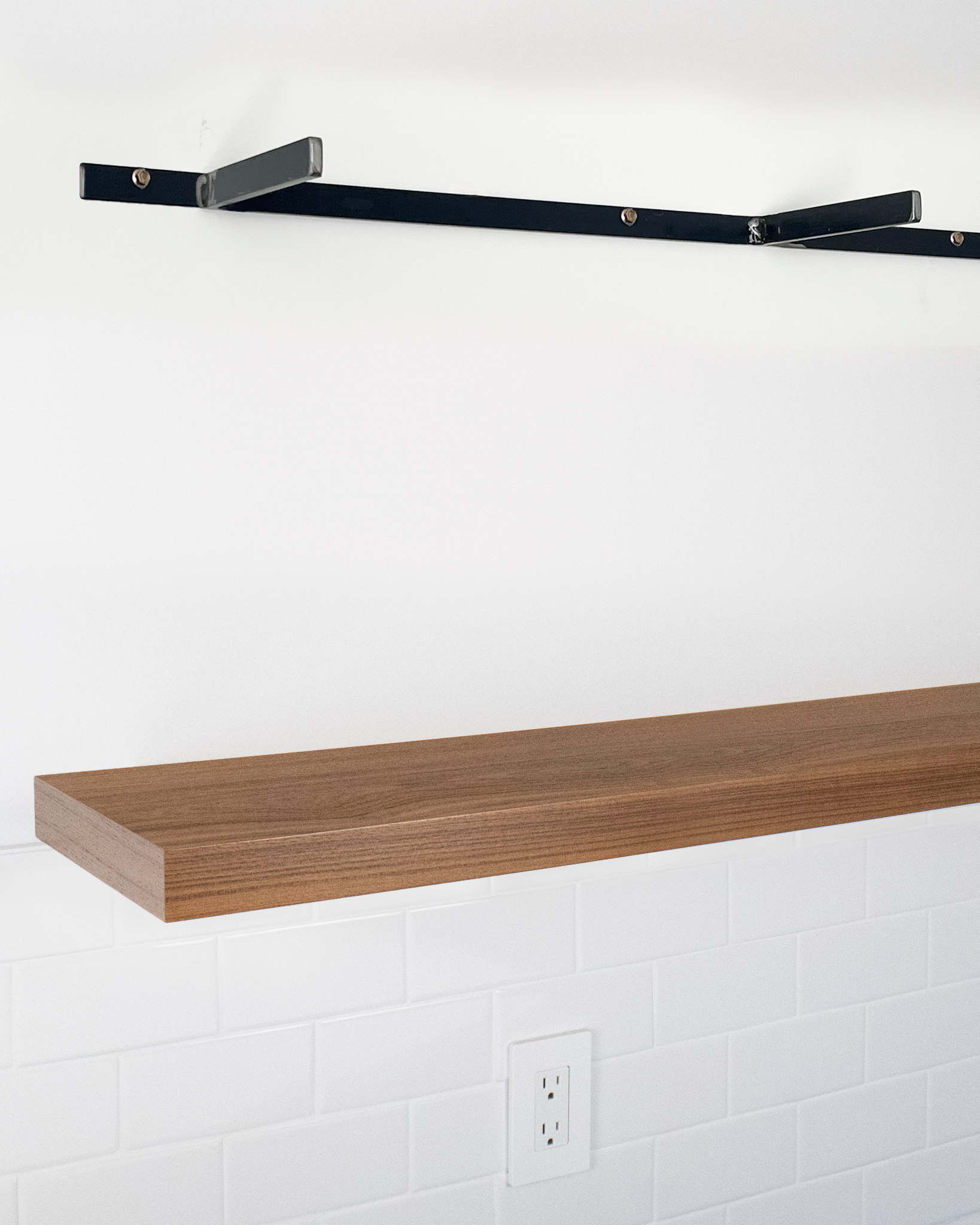 Teak floating shelf 1.75 inch thick angle view installed steel HW top