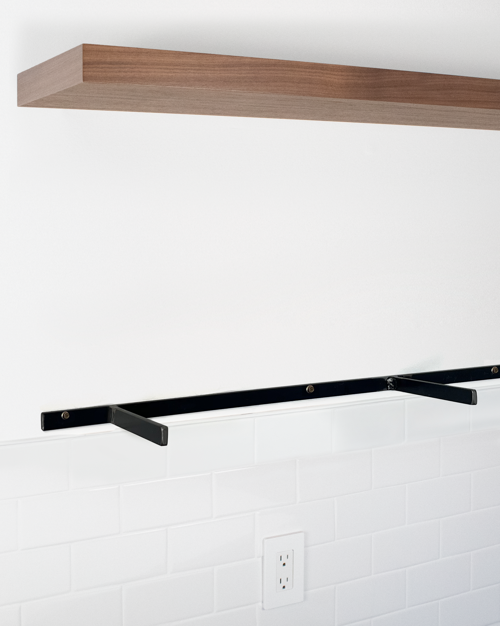Walnut floating shelf 1.75 inch thick angle view installed steel HW