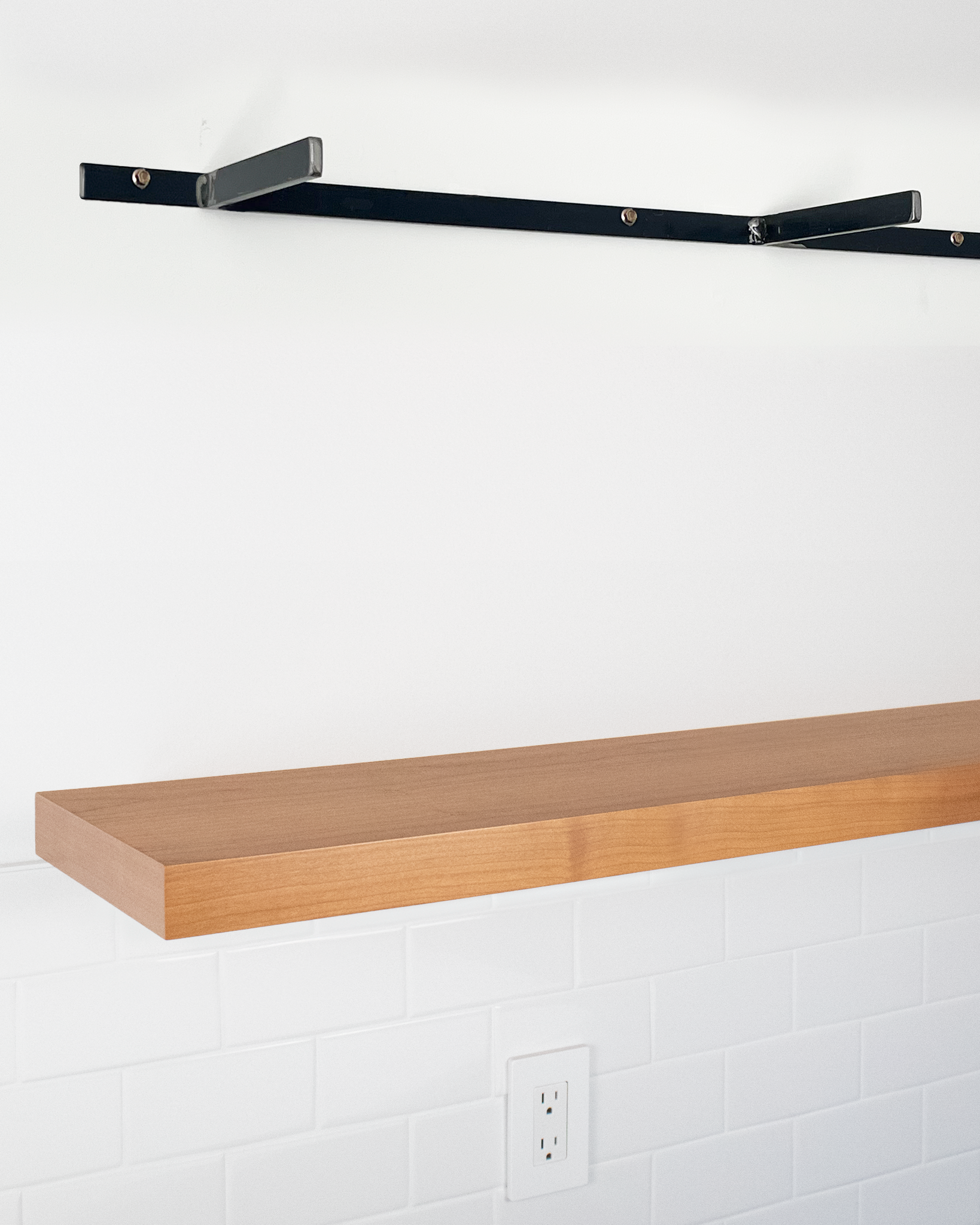 cherry floating shelf 1.75 inch thick angle view installed steel HW top