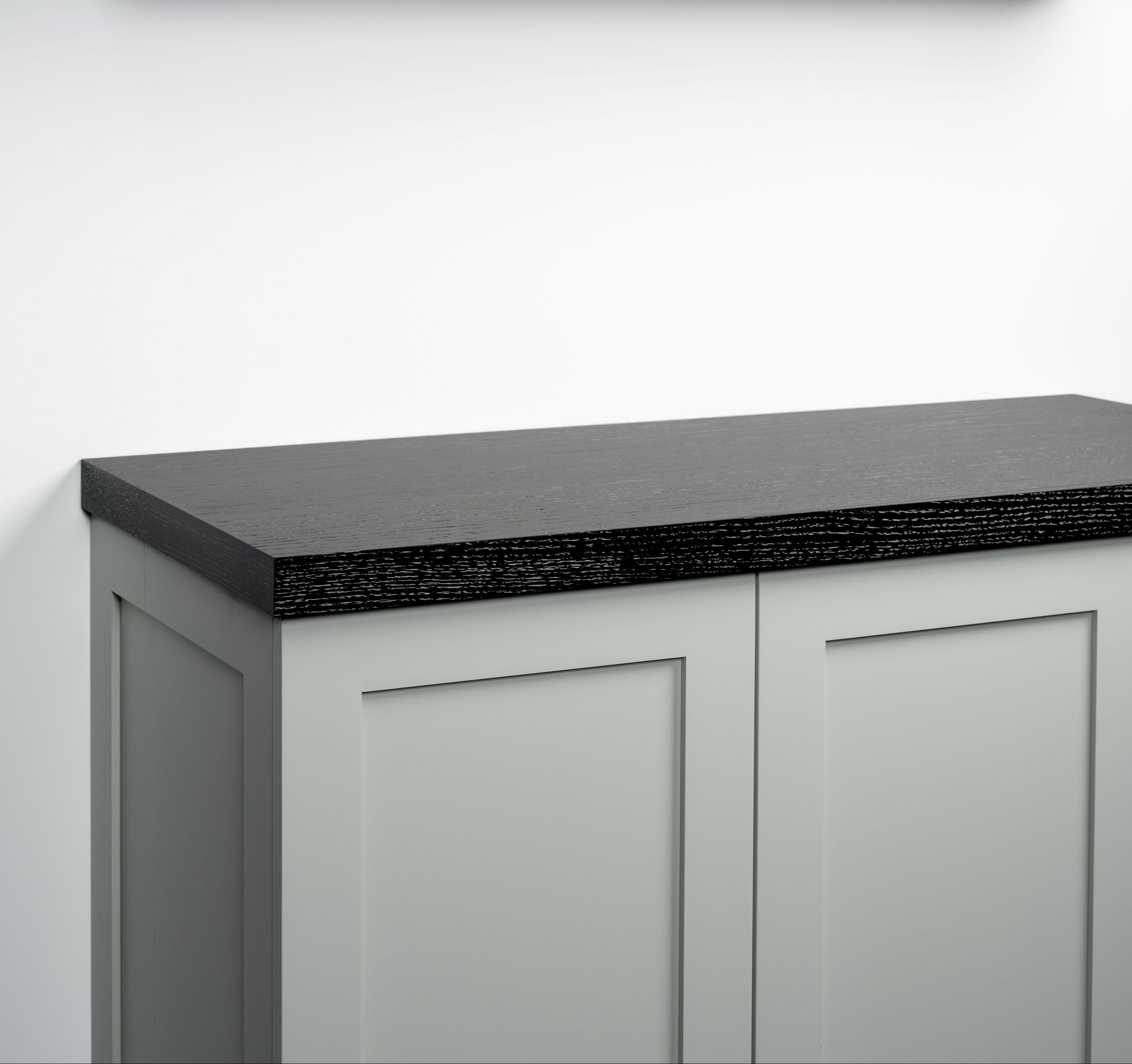 ebonized cerused oak cabinet top angle view