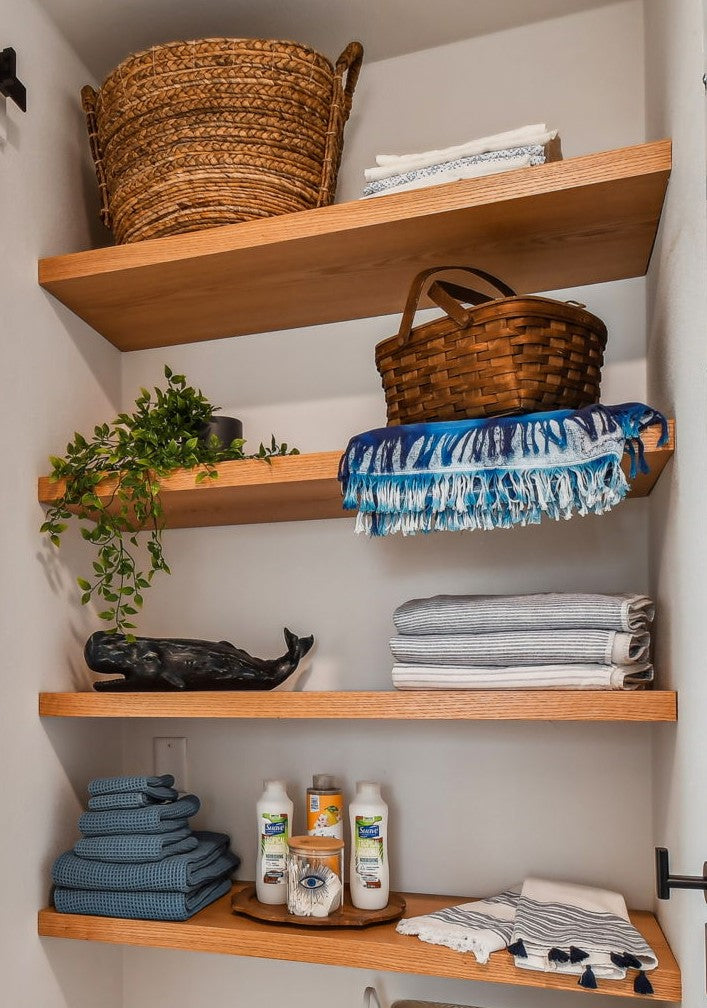 floating shelves fitted into a 3 sided niche