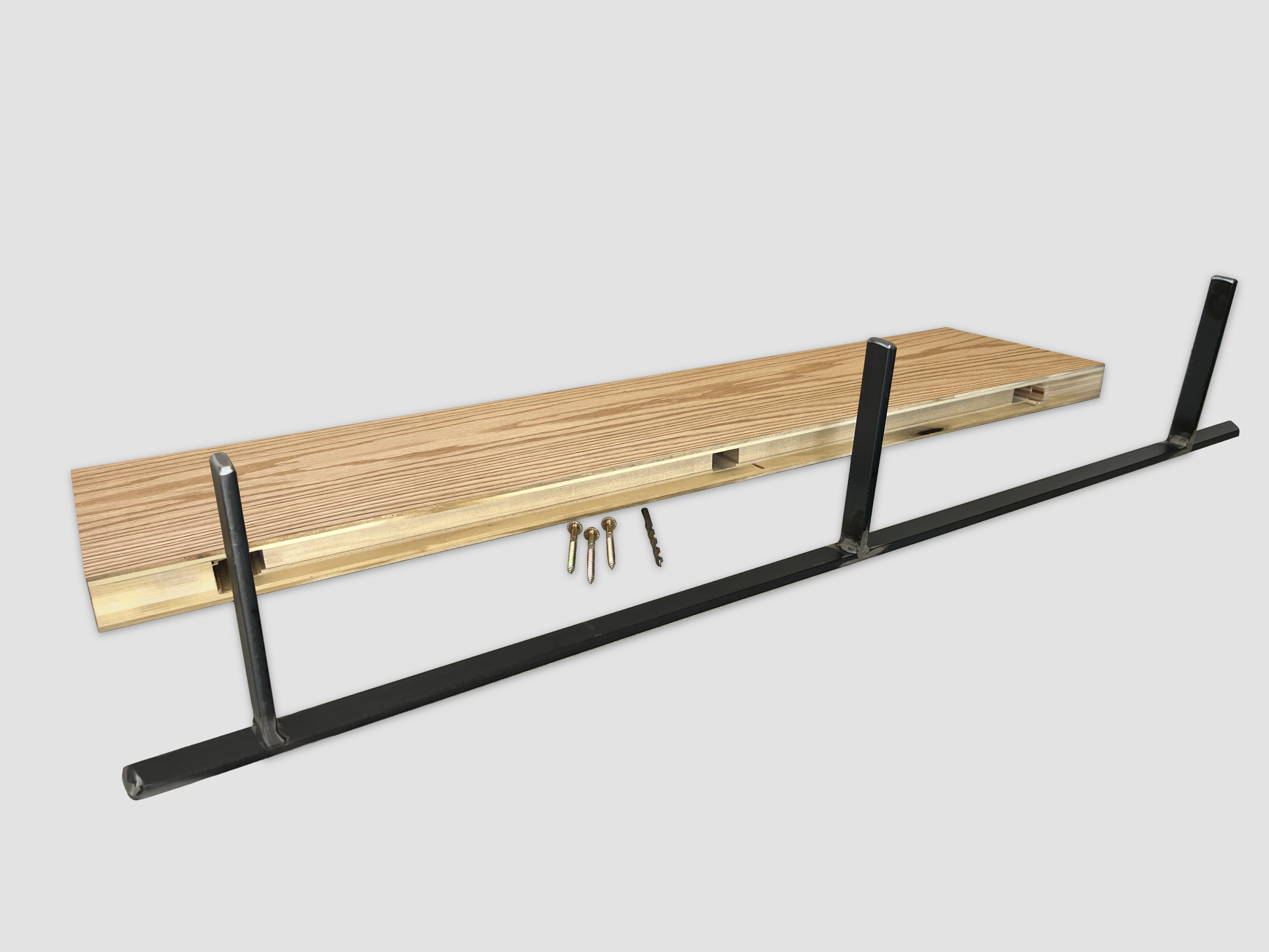 Red oak floating shelf back edge with black metal bracket on a white background