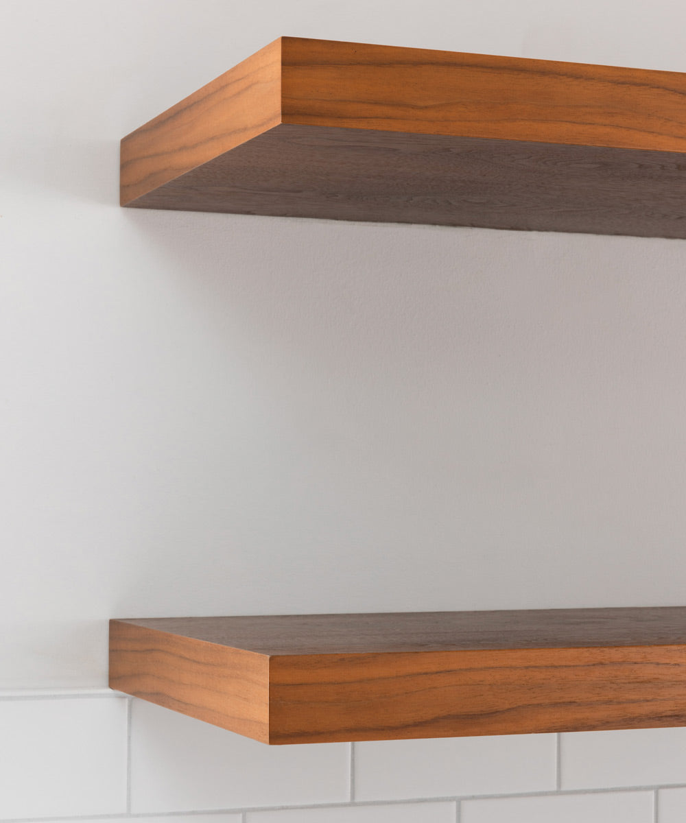 african mahogany floating shelves in a kitchen