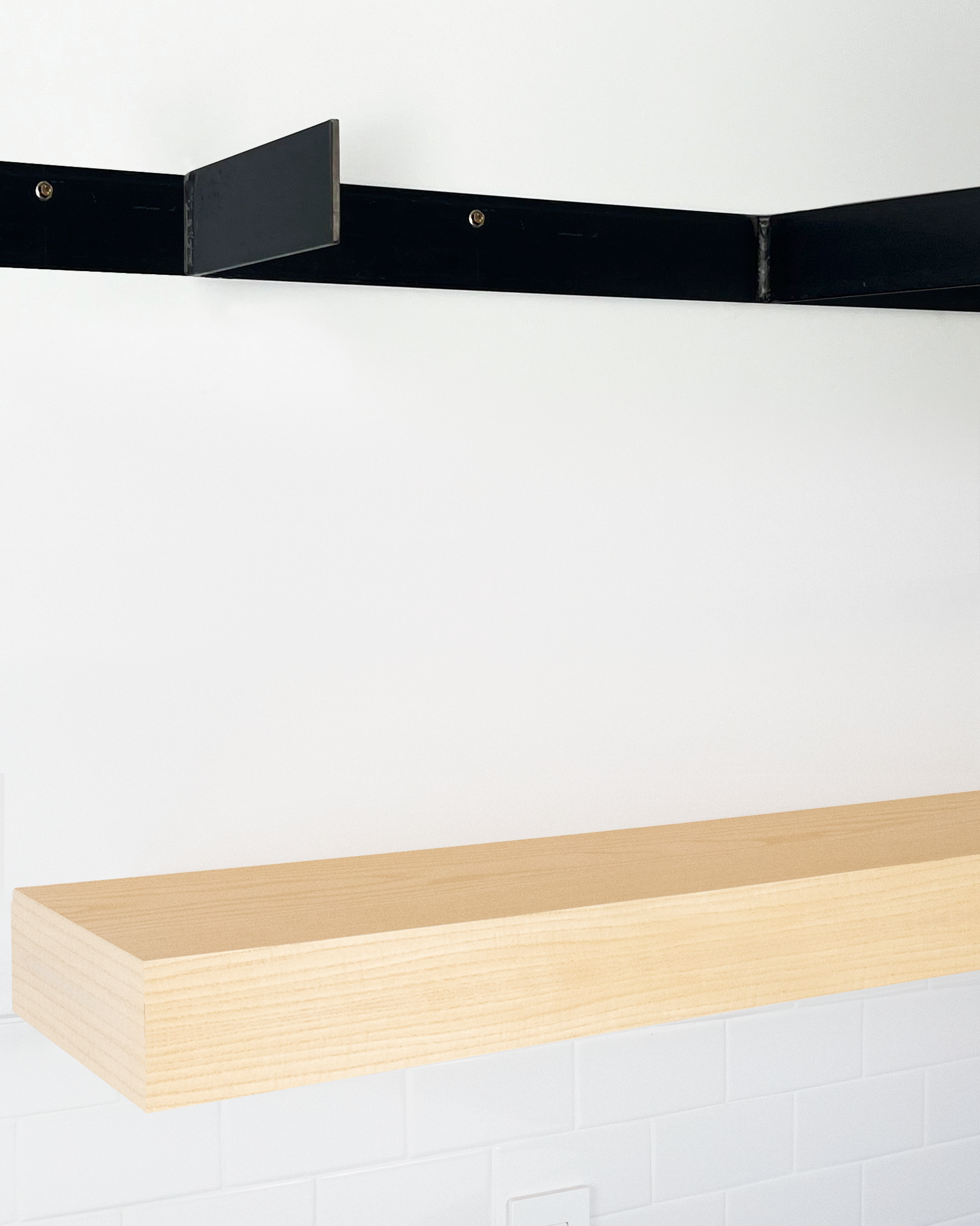Ash floating shelf 4 inch thick angle view installed steel HW top
