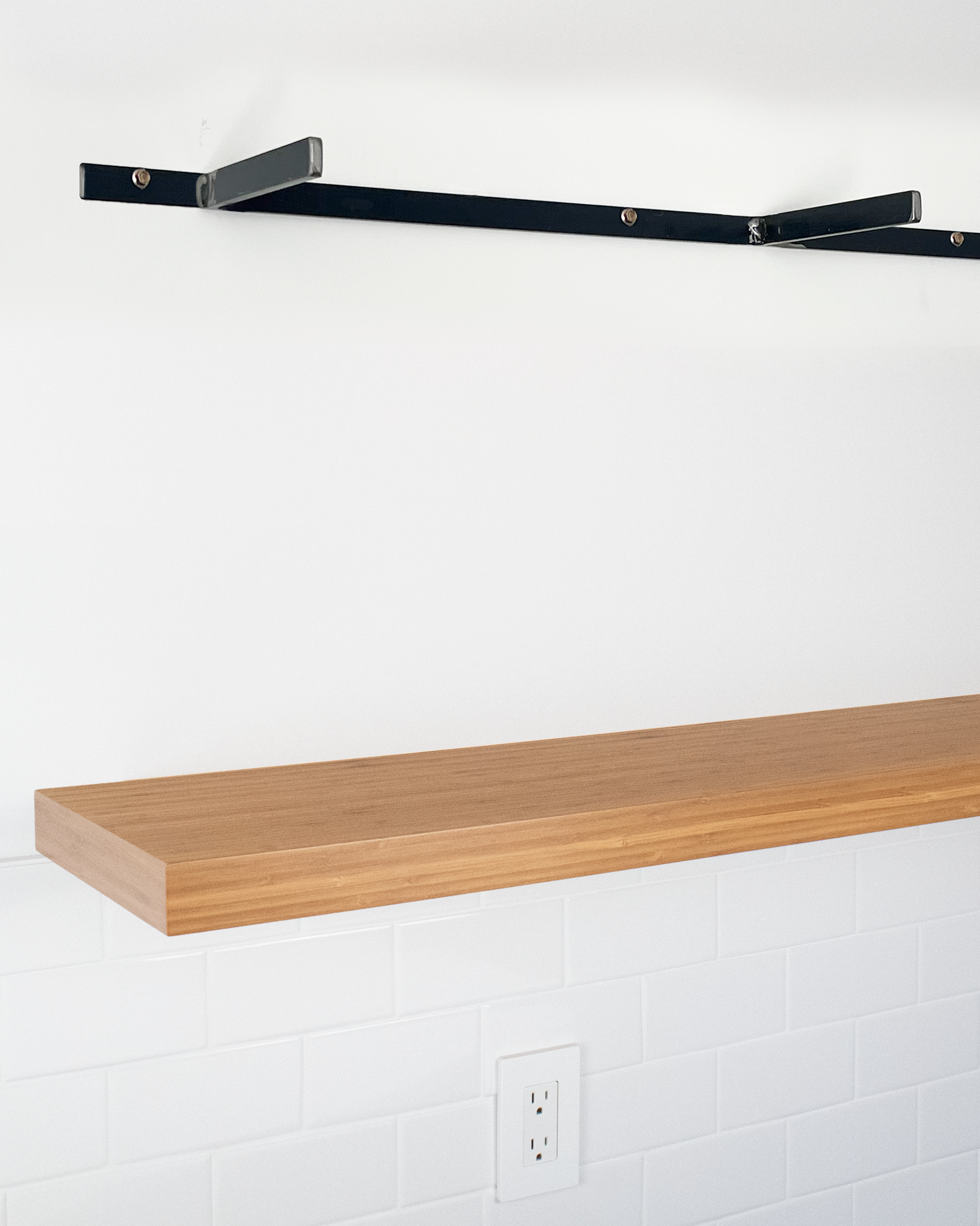 Bamboo floating shelf 1.75 inch thick angle view installed steel HW top