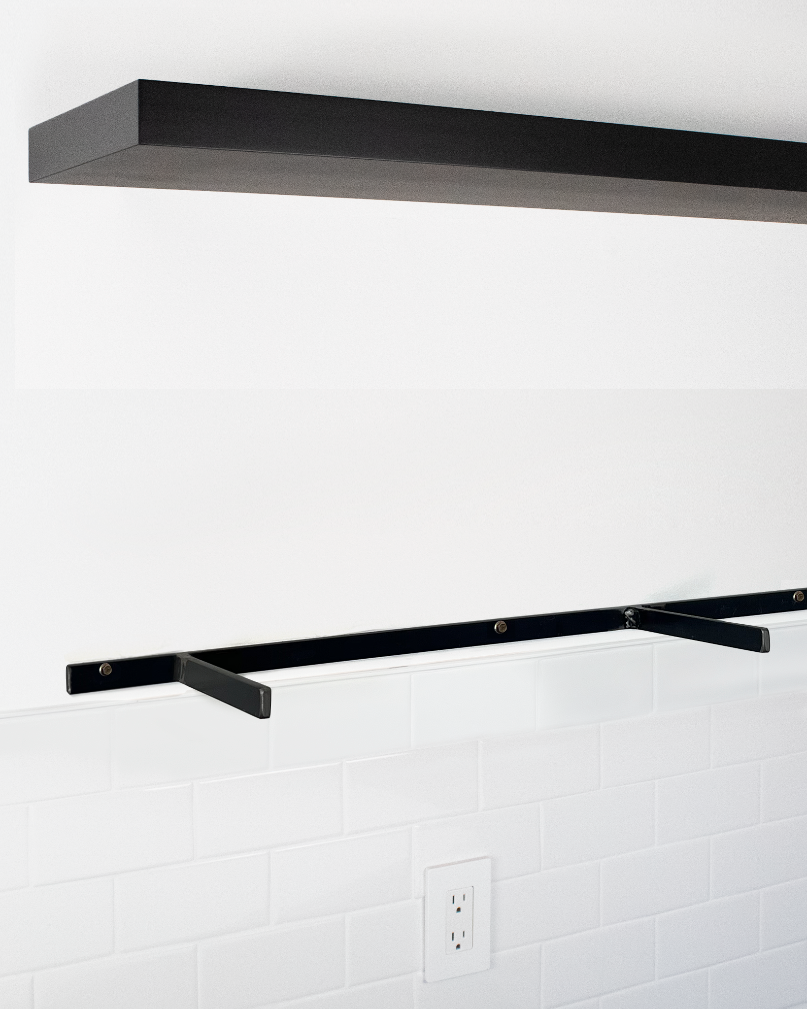 Black floating shelf 1.75 inch thick angle view installed steel HW