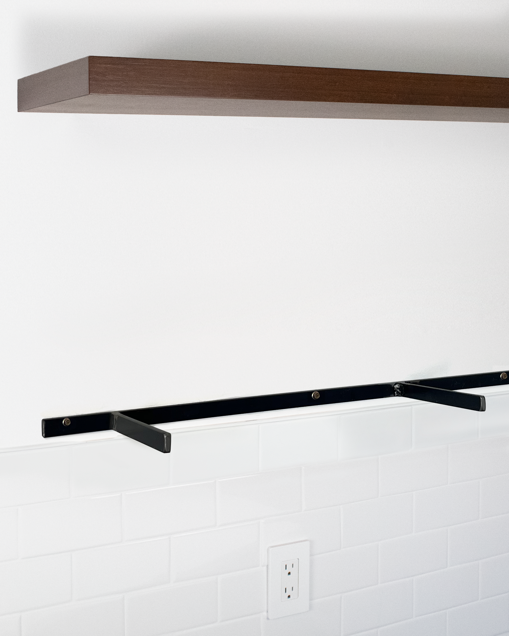 Chocolate bamboo floating shelf 1.75 inch thick angle view installed steel HW