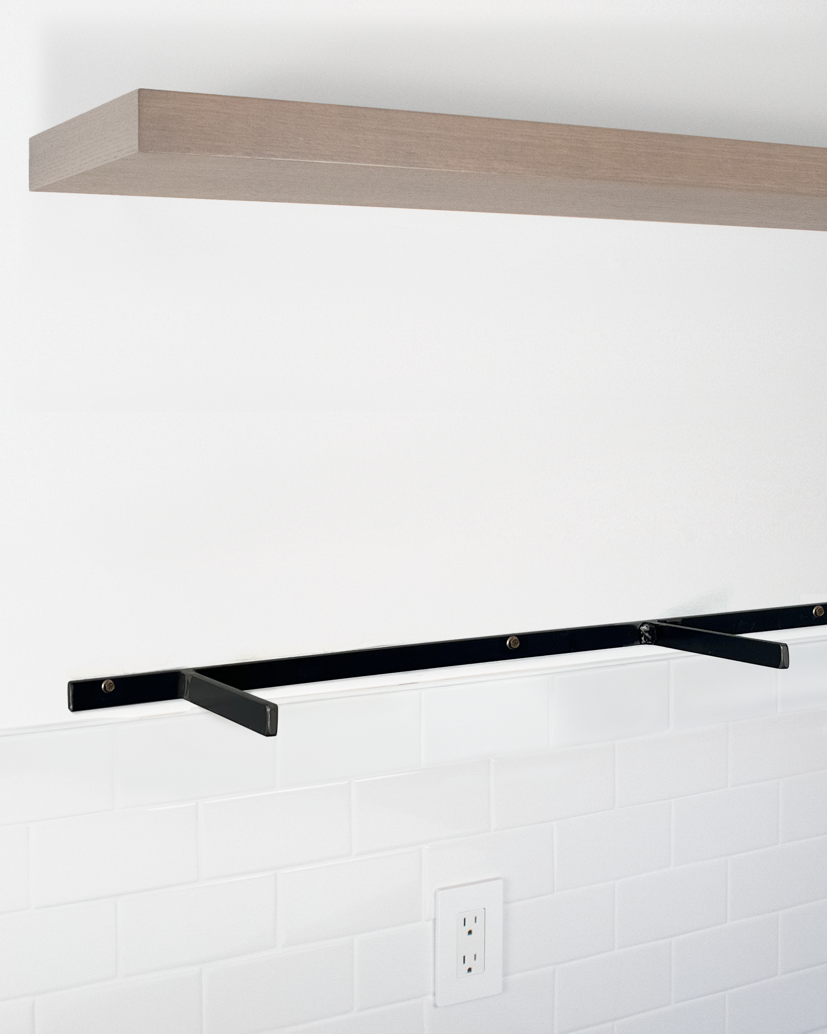 Driftwood grey oak floating shelf 1.75 inch thick angle view installed steel HW
