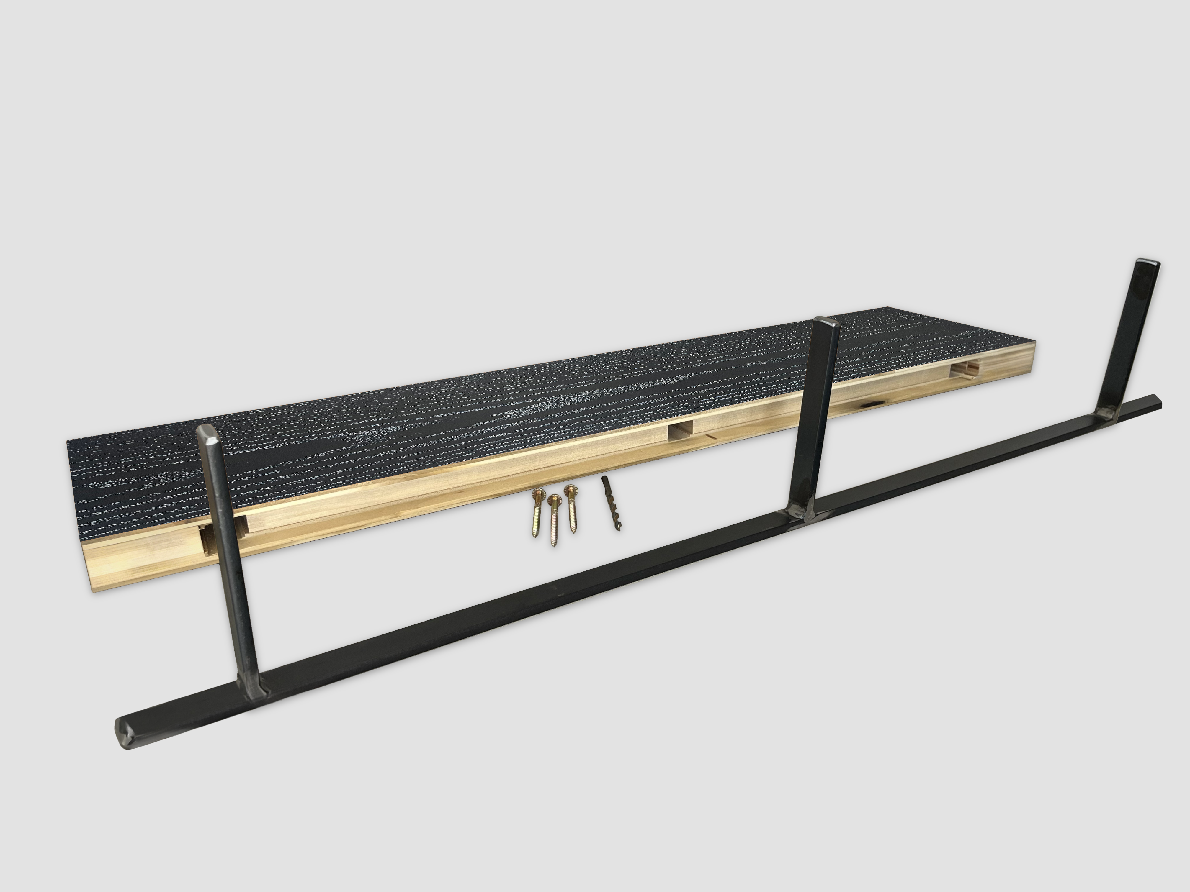 Ebonized Cerused Oak floating shelf back edge with black metal bracket on a white background 