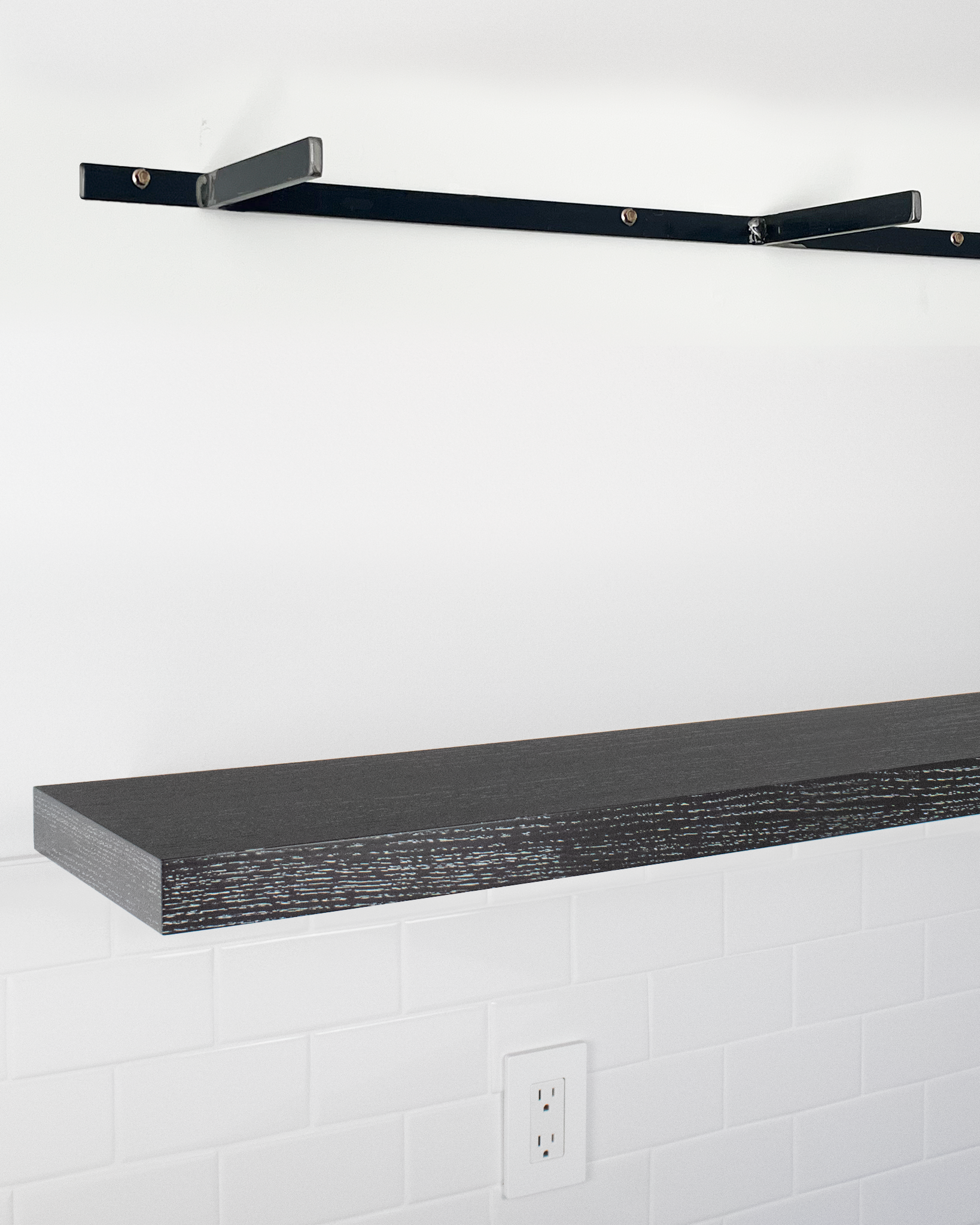 Ebonized cerused oak floating shelf 1.75 inch thick angle view installed steel HW top
