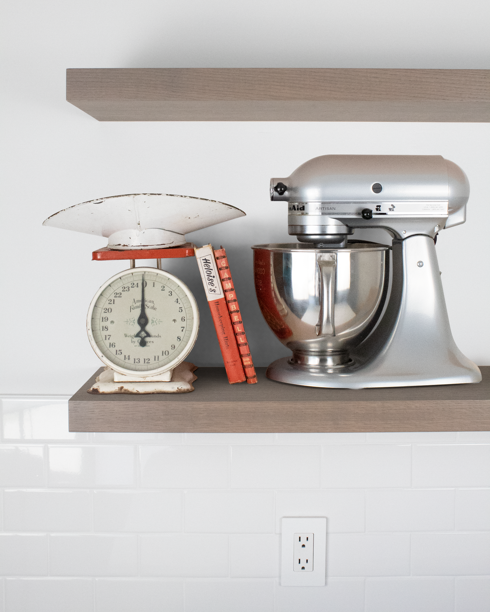 Grey oak floating shelf with stand mixer and scale on top