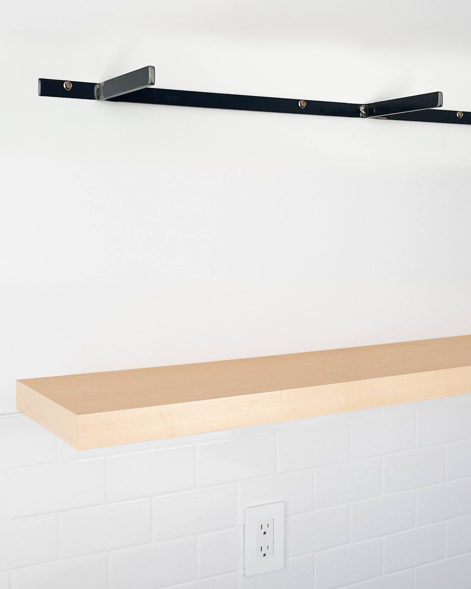 Maple floating shelf 1.75 inch thick angle view installed steel HW top