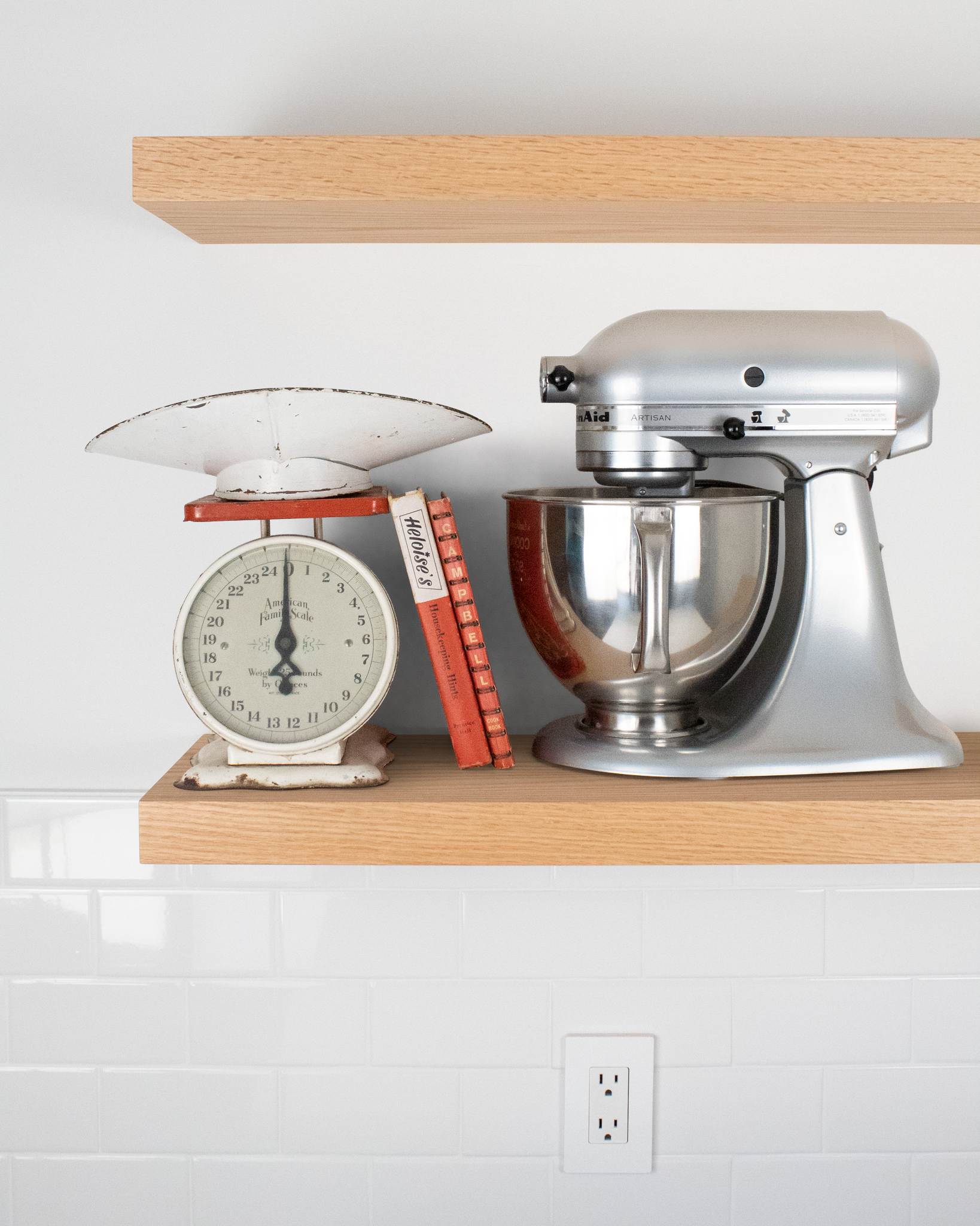 Floating shelf in red oak with mixer and scale placed on top