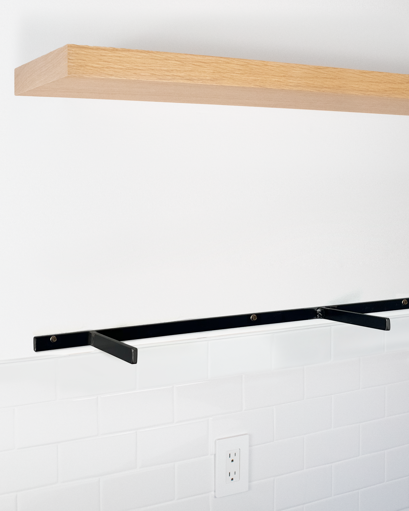 Rift white oak floating shelf 1.75 inch thick angle view installed steel HW