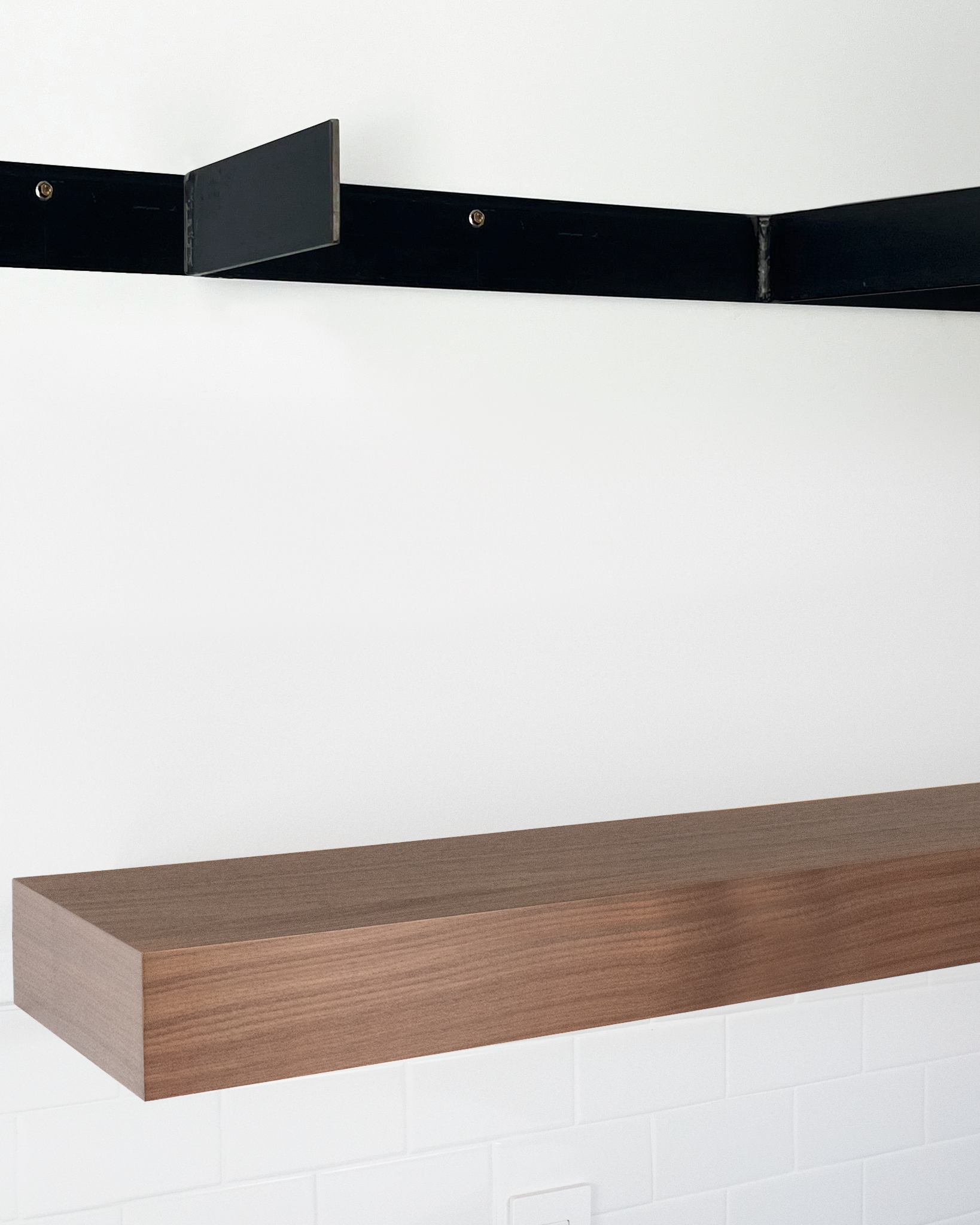 Walnut floating shelf 4 inch thick angle view installed steel HW top