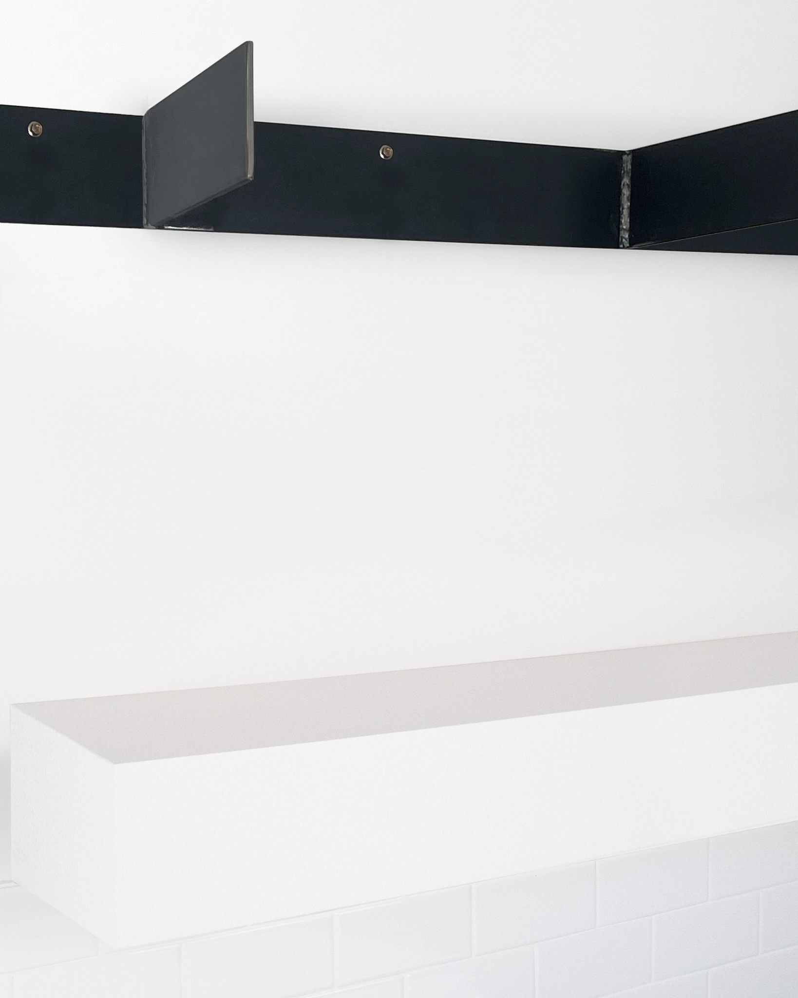 White floating shelf 6 inch thick angle view installed steel HW top