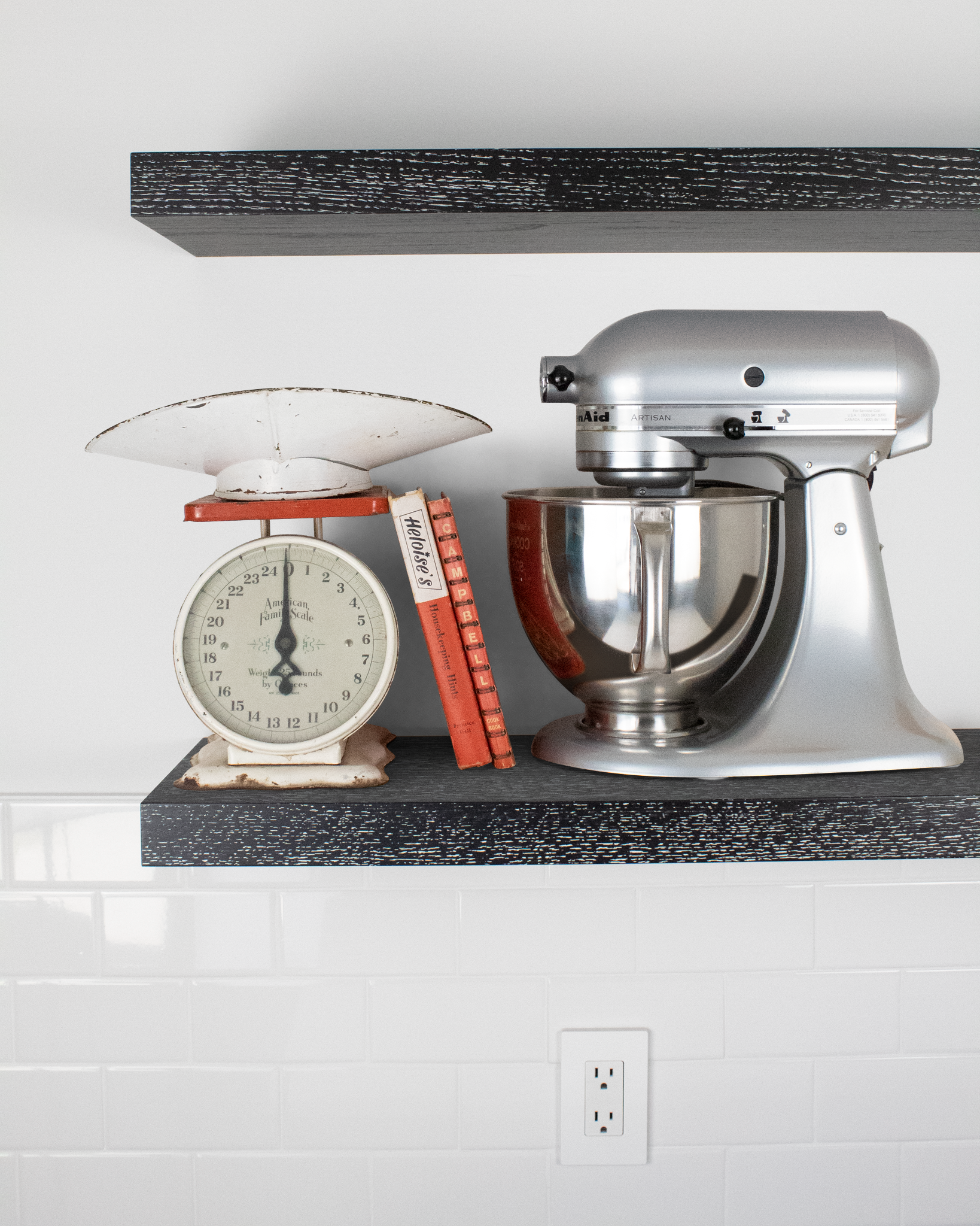 black oak floating shelves front view with stand mixer