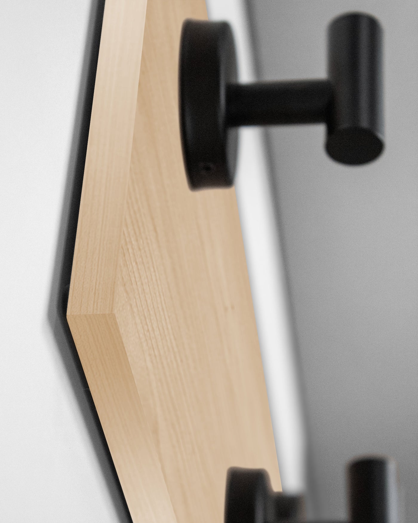 edge detail close up of Maple Wood wall hook rack matte black hooks