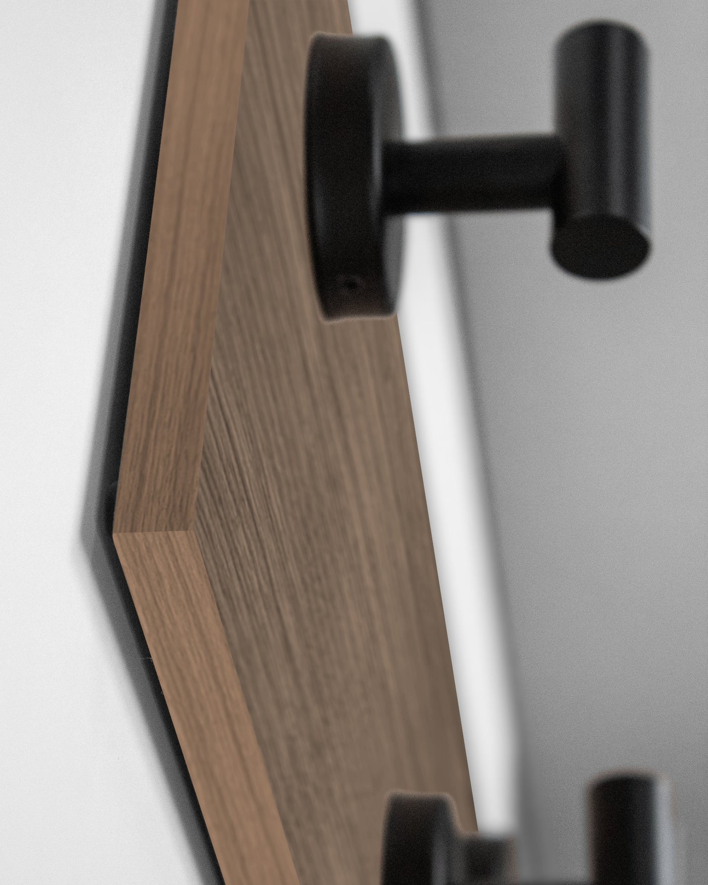edge detail close up of walnut Wood wall hook rack matte black hooks